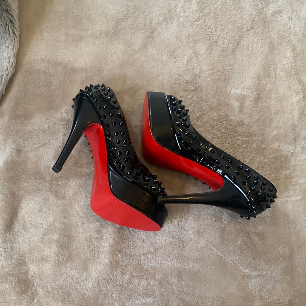 Spiked open toe pumps